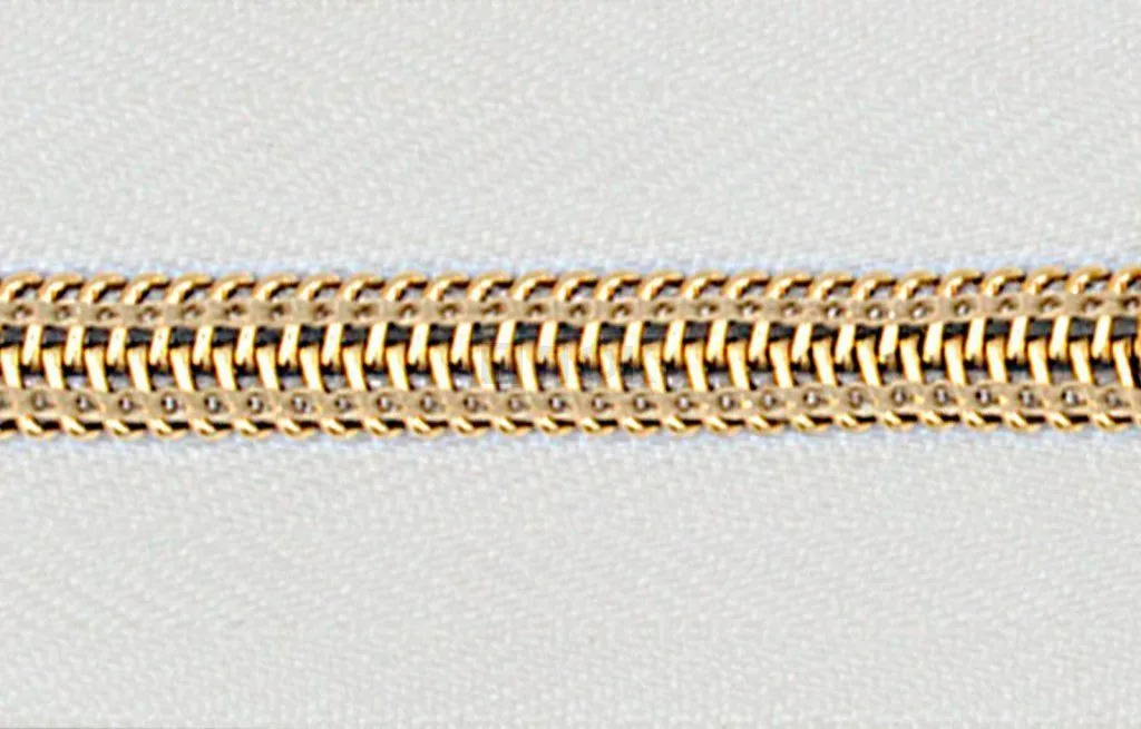 Рулонная молния спиральная (витая) тип 5 декоративная цв 101 зв Rus Gold (рул 200м/уп 2000м)